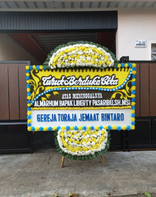 Papan Bunga Duka di Pengarom